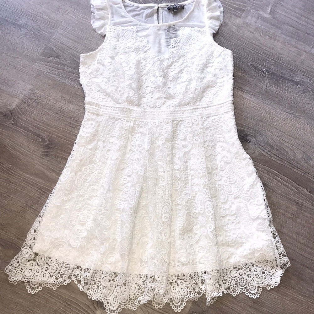 Party or any occasion JGEE white lace dress.